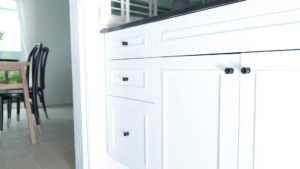 Is it worth spraying your old kitchen cabinets?